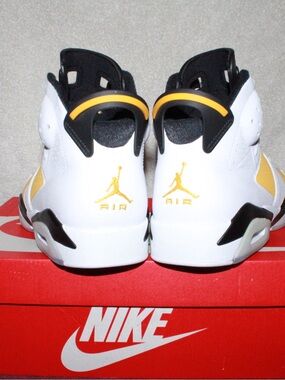Nike Mens White and Yellow Ochre Jumpman Sneakers